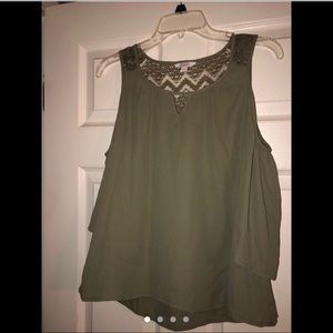 Sheer green lacey blouse.